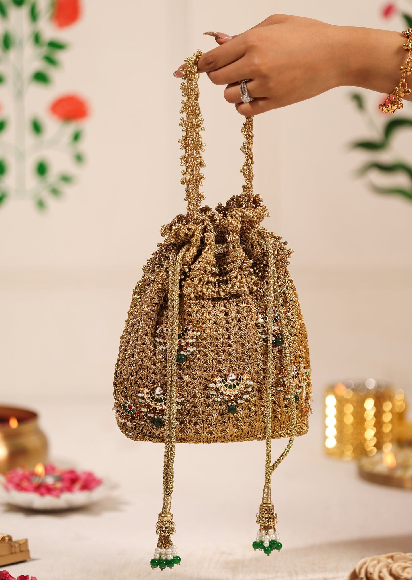 Gold Brocade Potli With Green And White Embellished Detailing