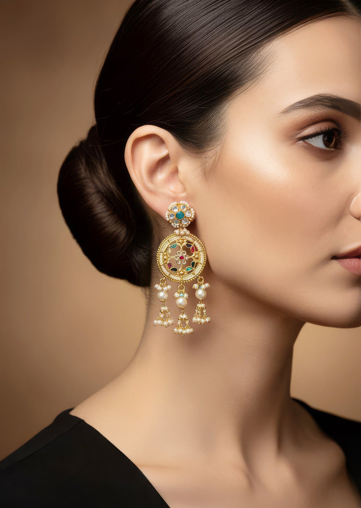Gold Finish Earrings With Traditional Temple Motifs And Green Purple Red Yellow and Blue Simulated Stones And Faux Pearls.