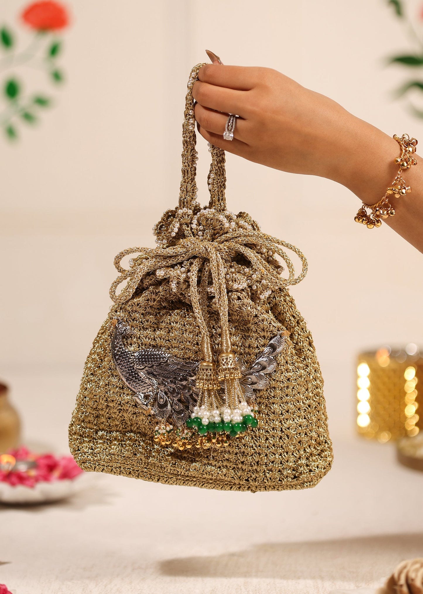 Gold Peacock Brocade Potli With Silver Embellished Detailing