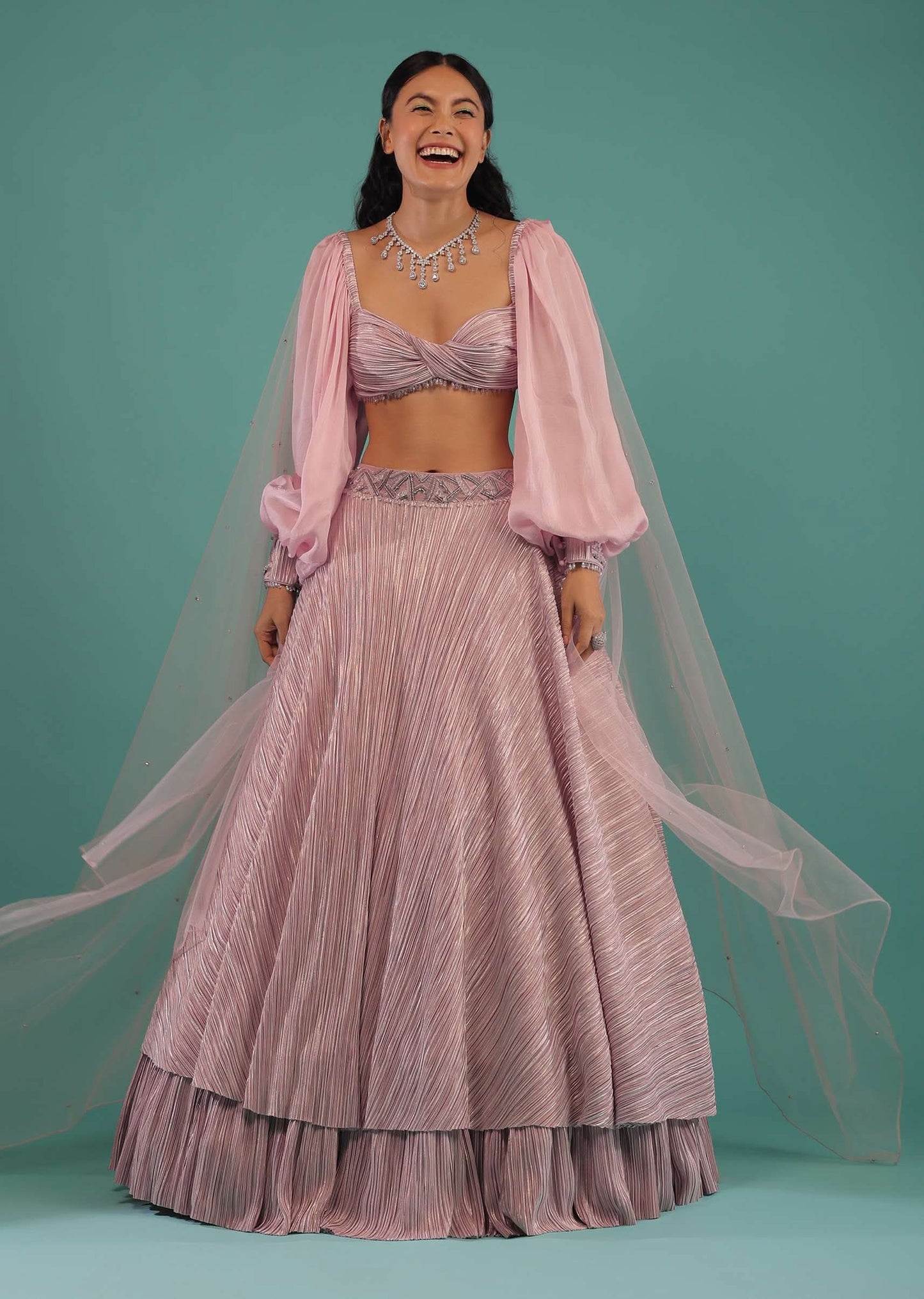 Ice Lavender Lehenga In Shimmer Crush With A Twisted Bandeau Crop Top Designed With Bishop Sleeves