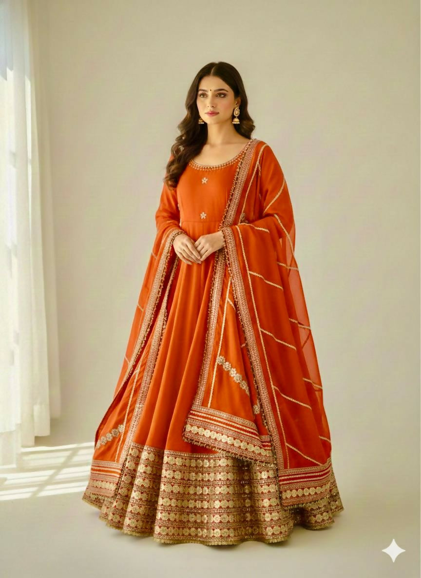 Teeya Creation Womens New Fancy Silk Heavy Quality Fabric With Handwork Orange Gown Set