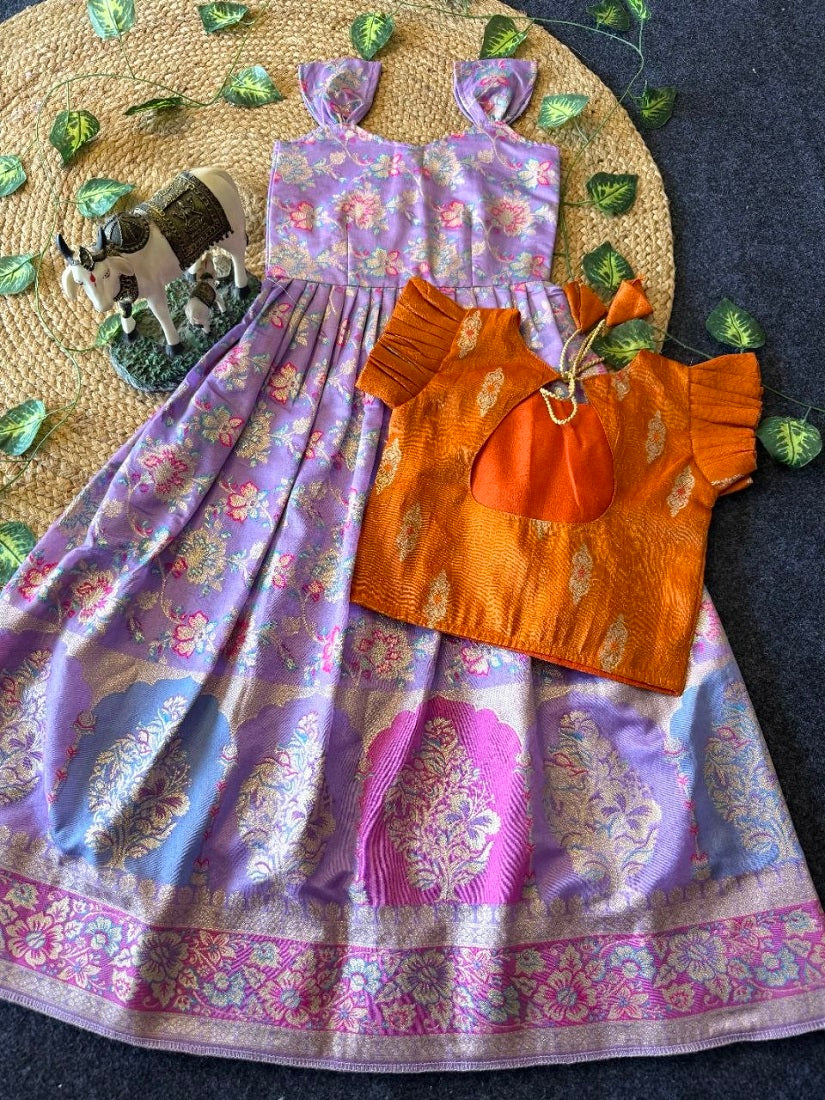 Evanik Festive Wear Lavender Dola Silk zari and thread weaving Gown With Orange Koti