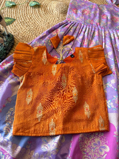 Evanik Festive Wear Lavender Dola Silk zari and thread weaving Gown With Orange Koti