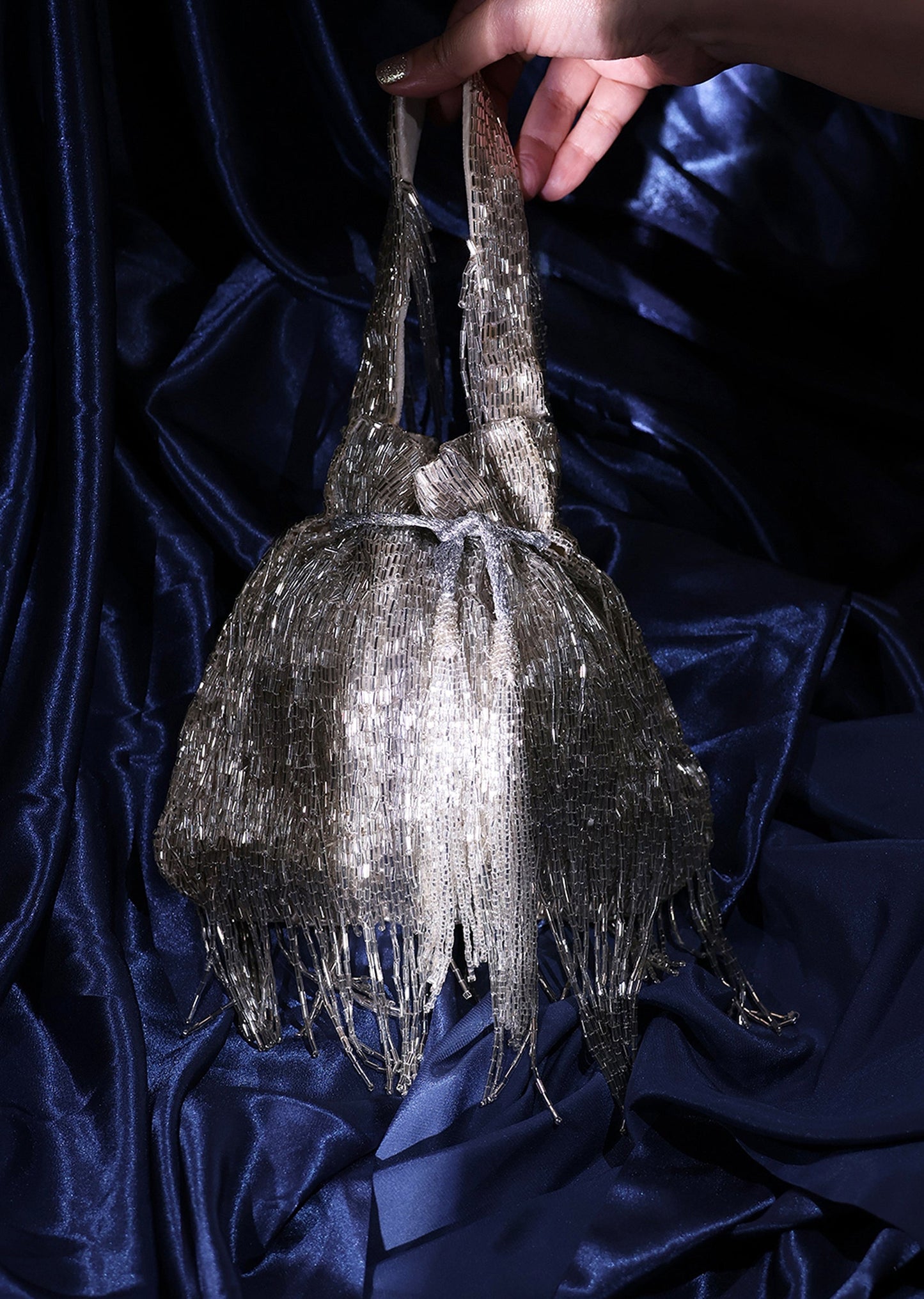 Luminous Silver Cut Dana Potli