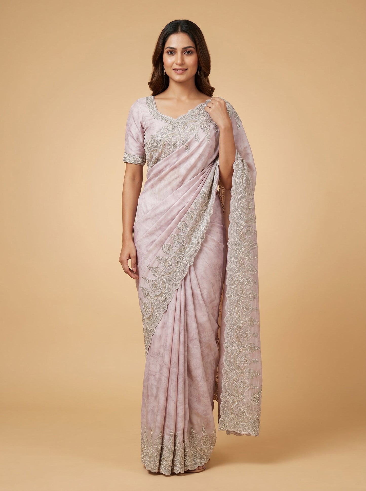 Pink embroidered saree with delicate detailing