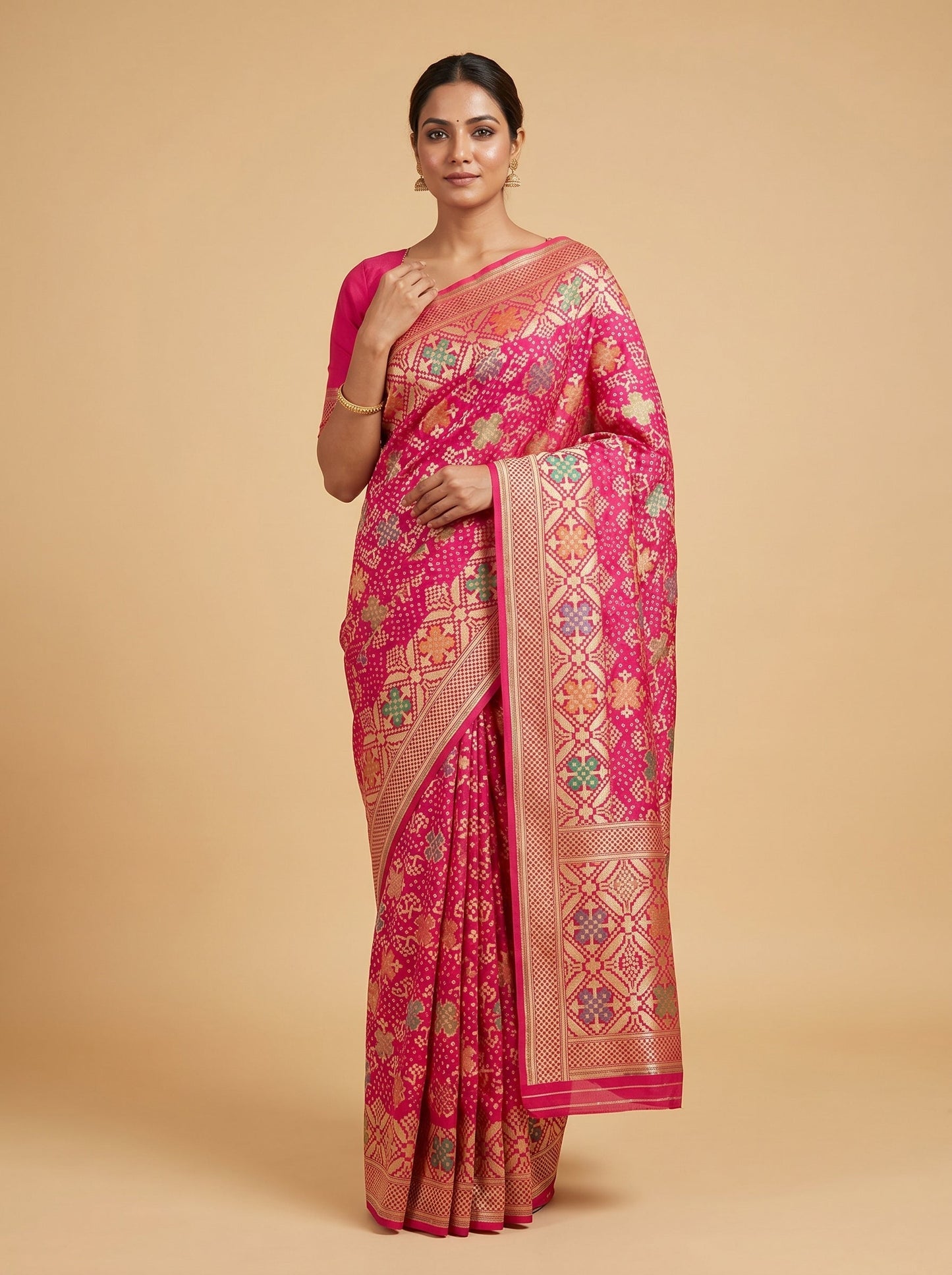Rani Pink Bandhani Saree with Festive Appeal