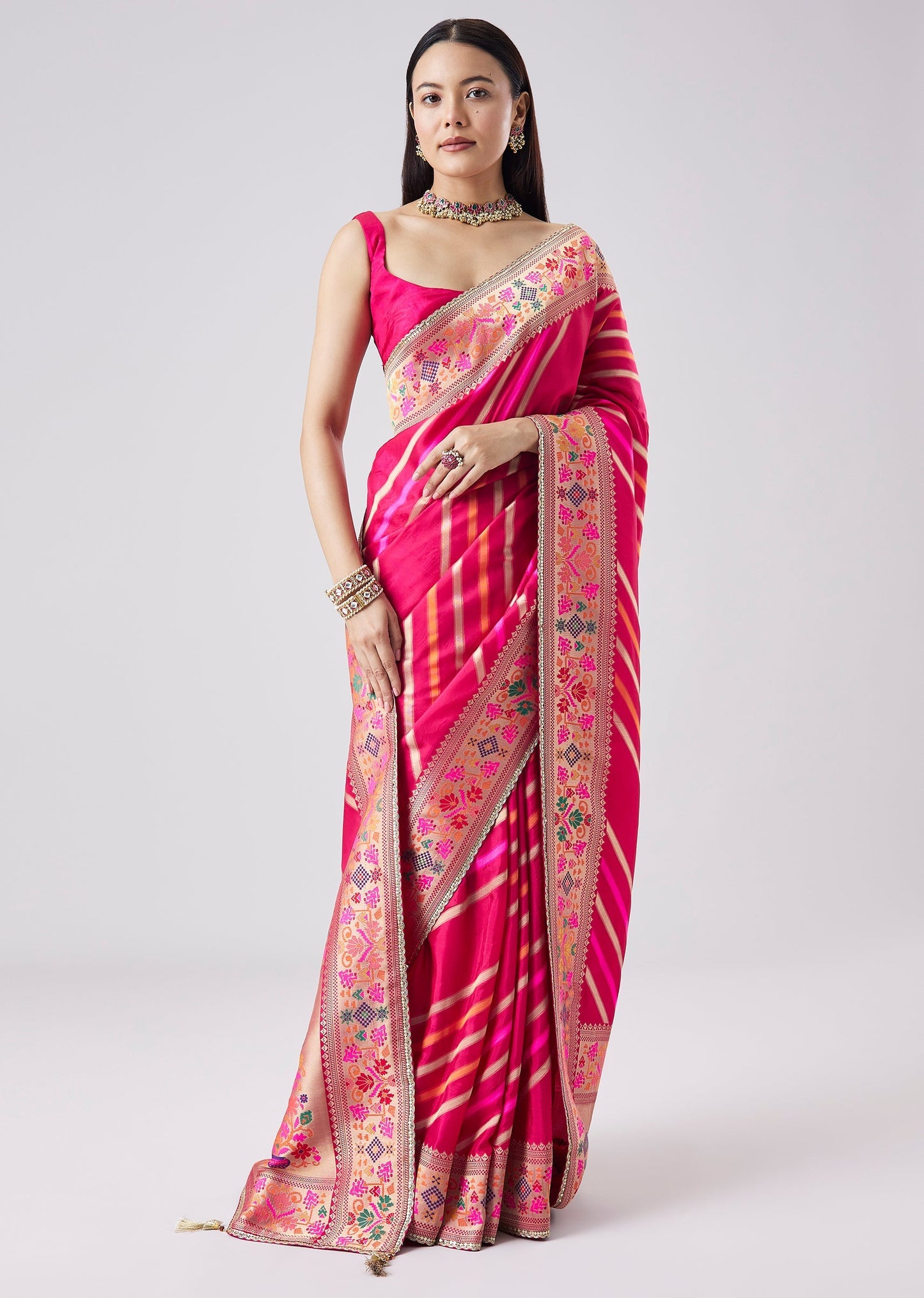 Rani Pink Woven Saree With Unstitched Blouse