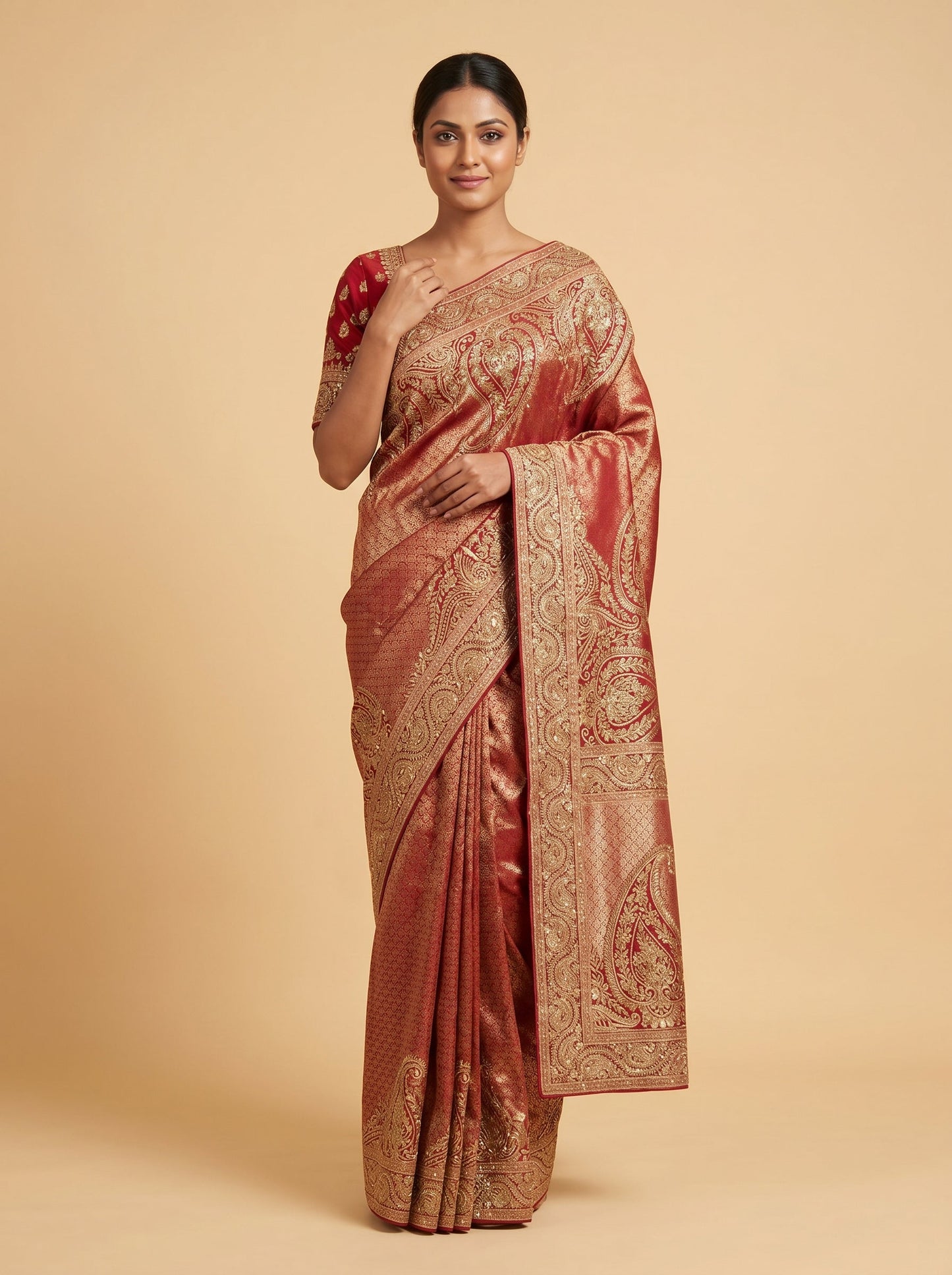 Red embroidered saree with detailed motifs
