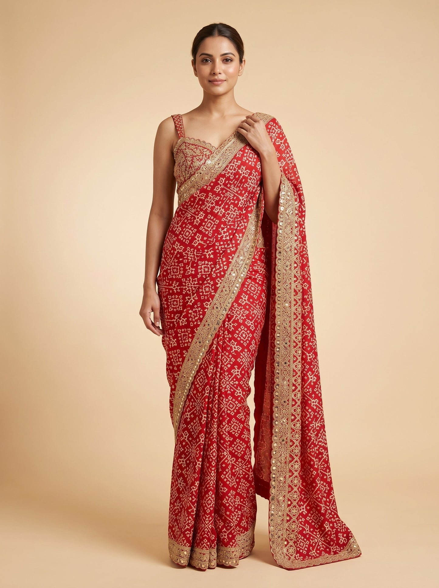 Red embroidered saree with traditional motifs