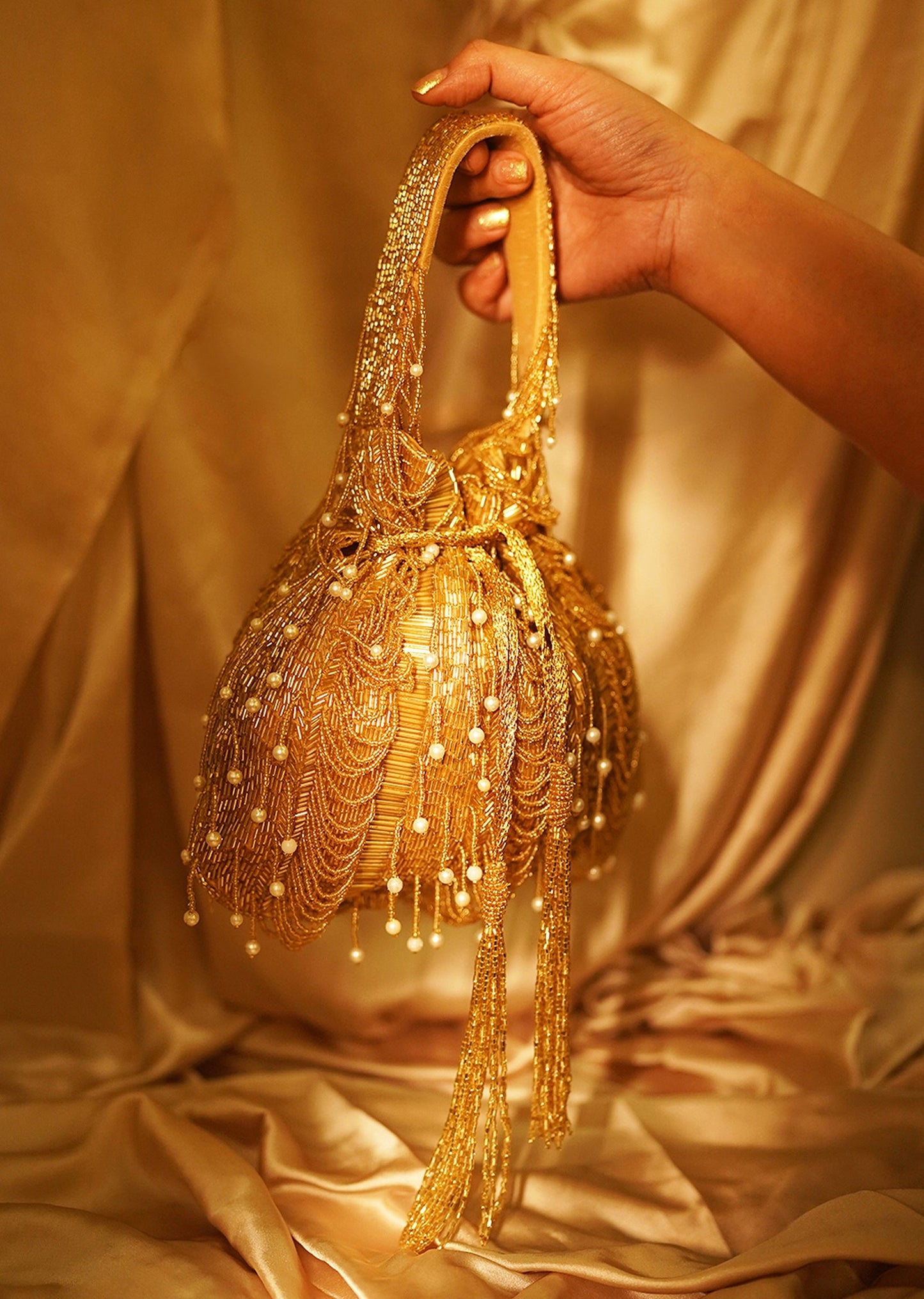 Regal Gold Cut Dana Potli Bag