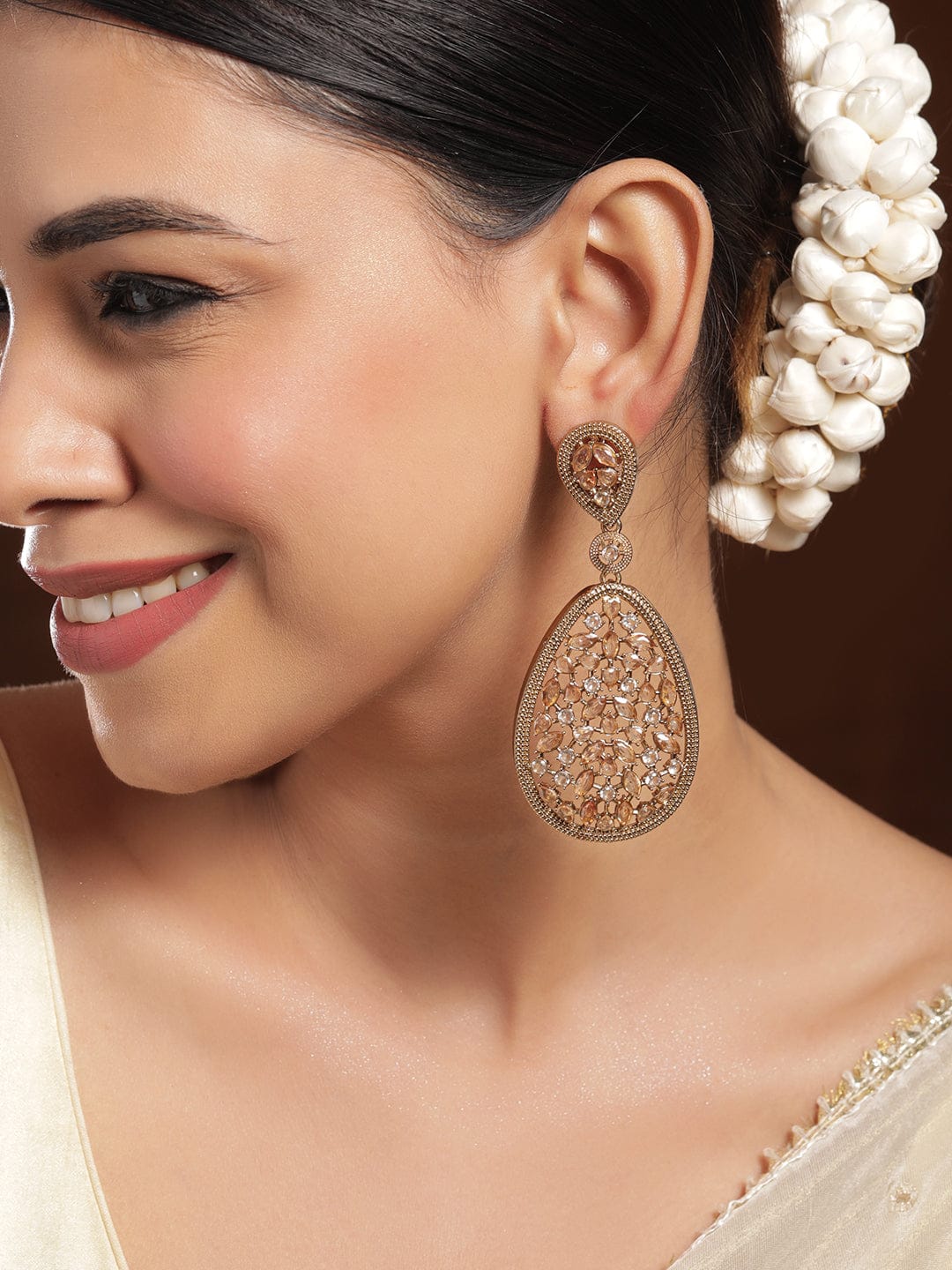 Golden Aura American Diamond Zirconia Dangling Earrings