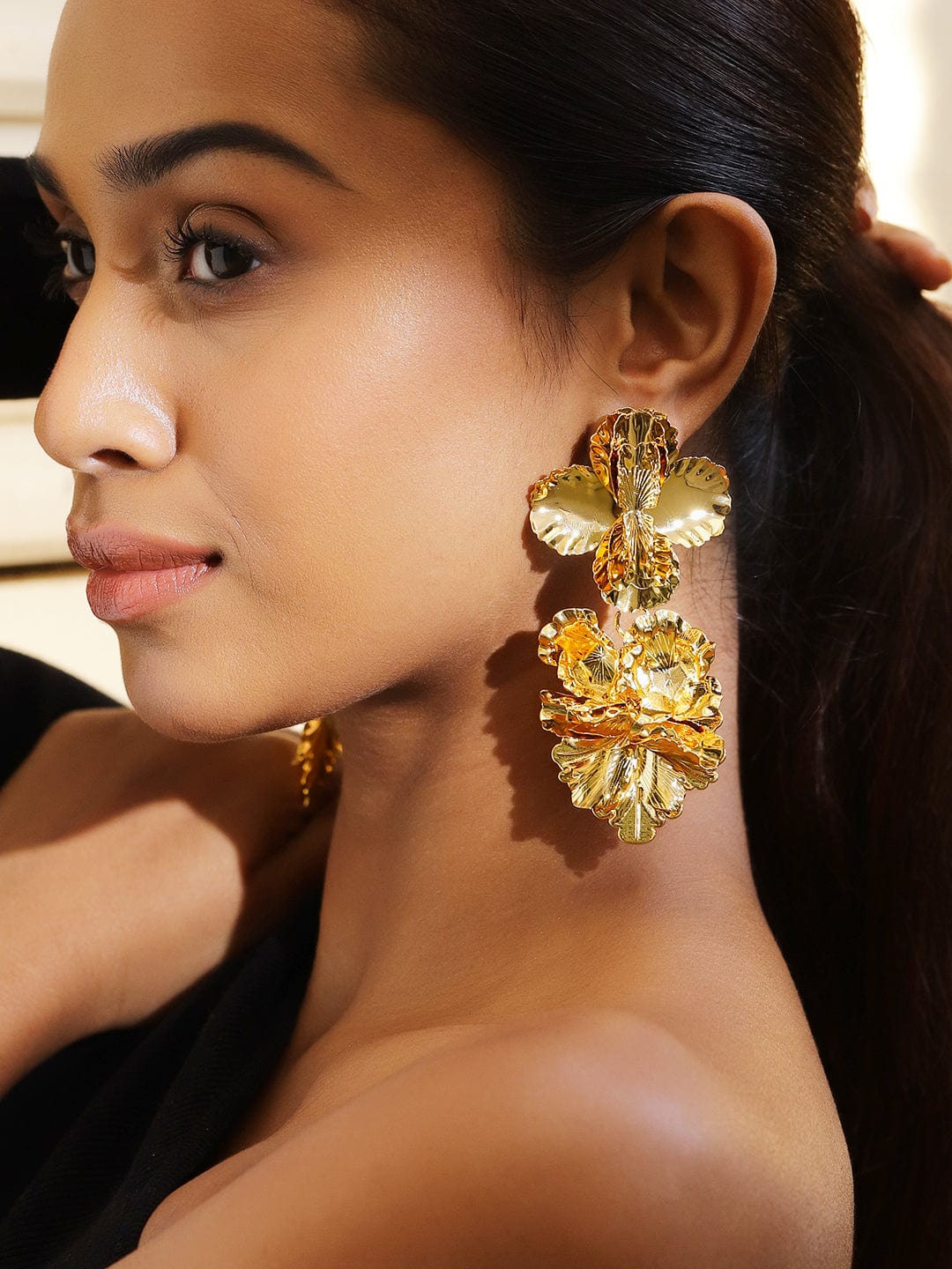 Gold Toned Leaf Motif Dangler Earrings