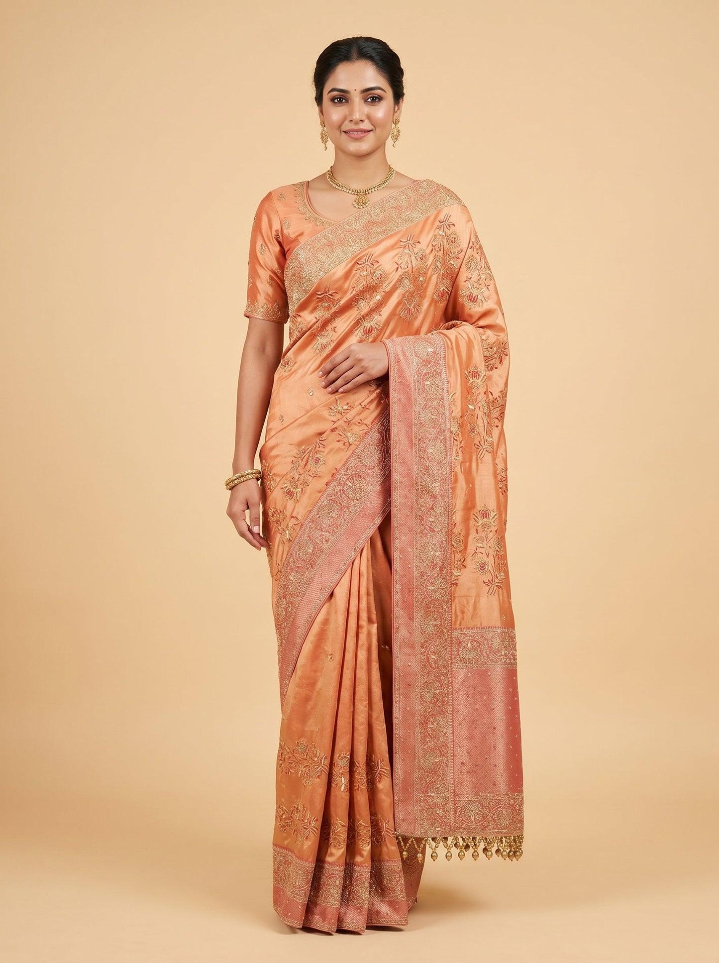 Rust embroidered saree with rich motifs