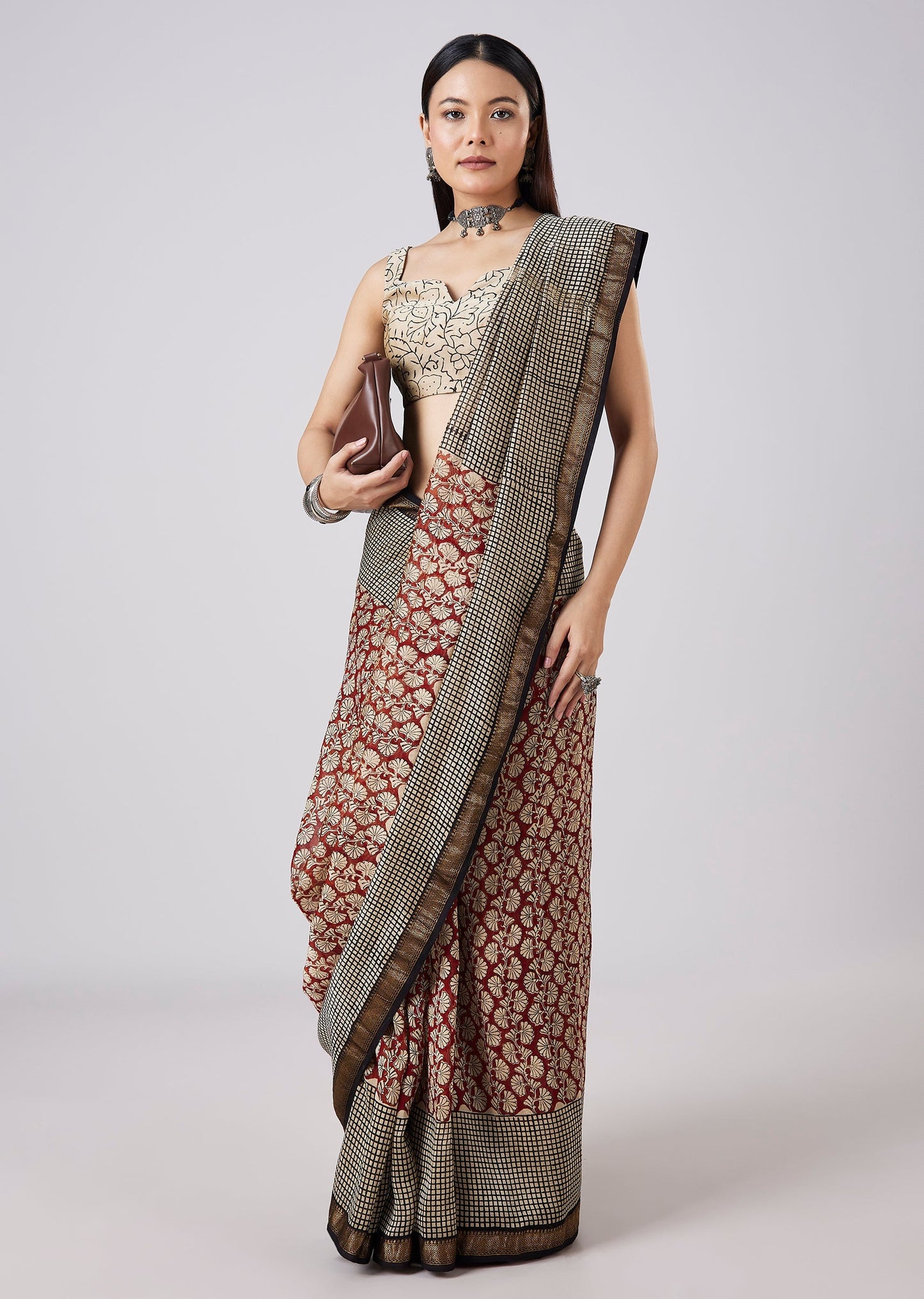 Rust Saree with Hand Painted Motifs and Stitched Blouse