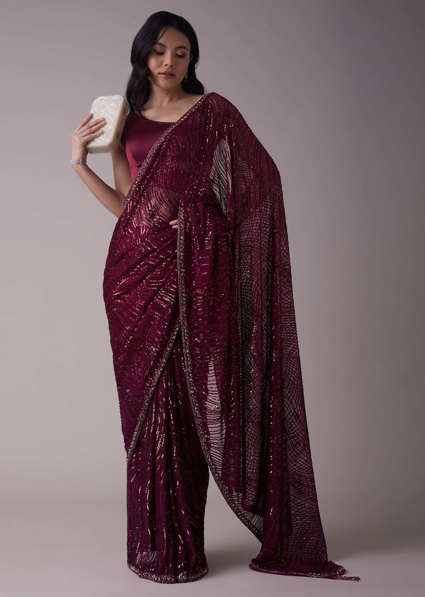 Wine Sequins Saree With An Embellished Border