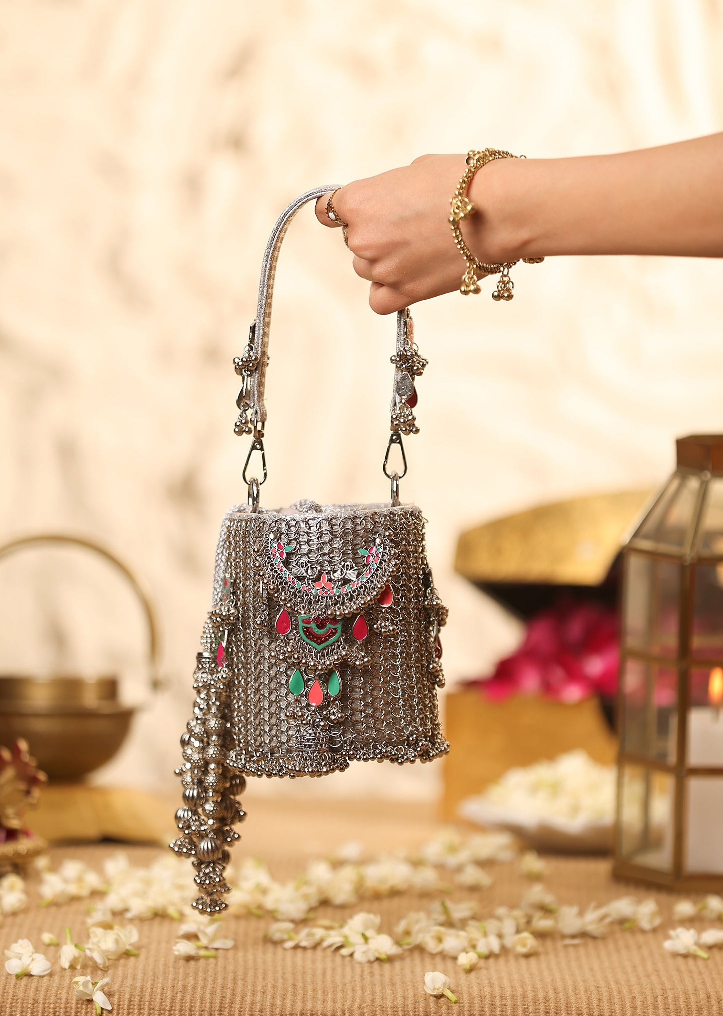Silver Metal Potli With Embellished Detailing