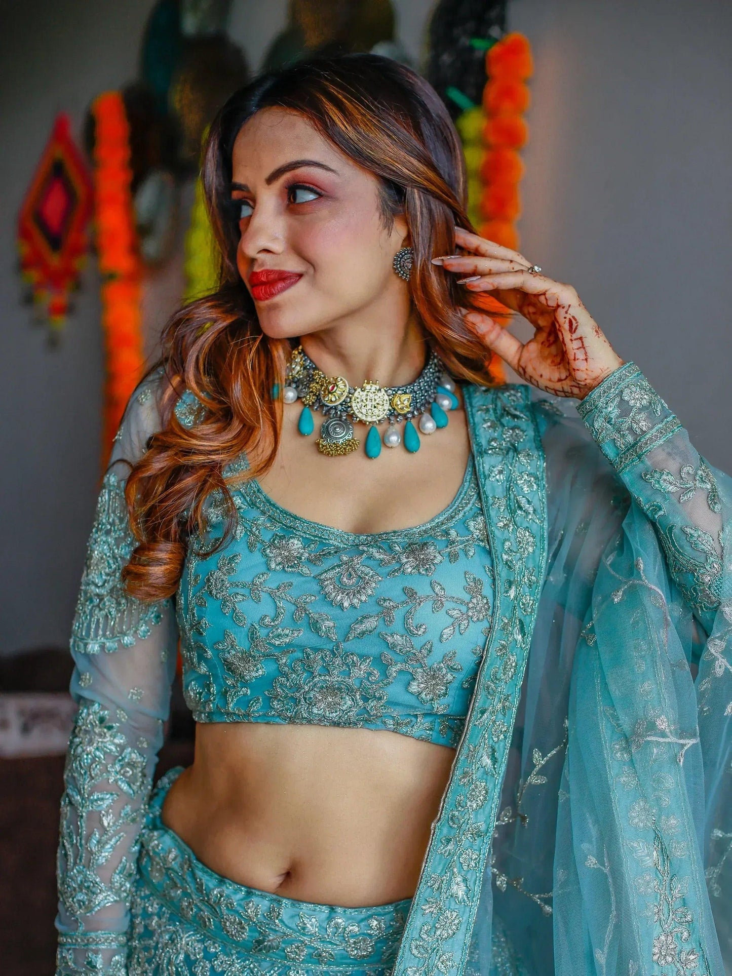 Tulsi Art Stunning Aqua Blue Embroidered Soft Net Occasion Wear Lehenga Choli
