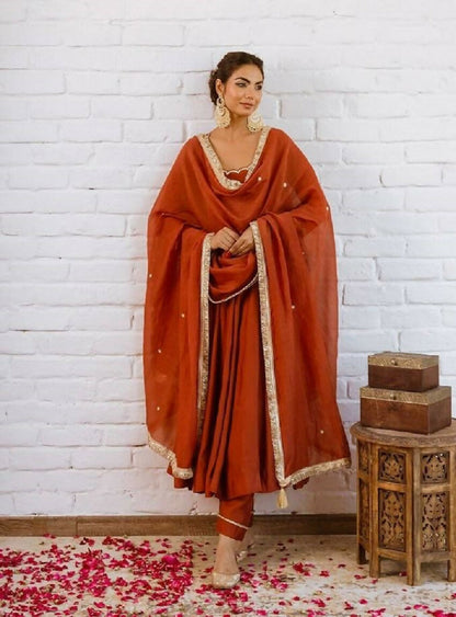 Teeya Creation Rust Orange Solid Anarkali Kurta With Pants And Dupatta Set