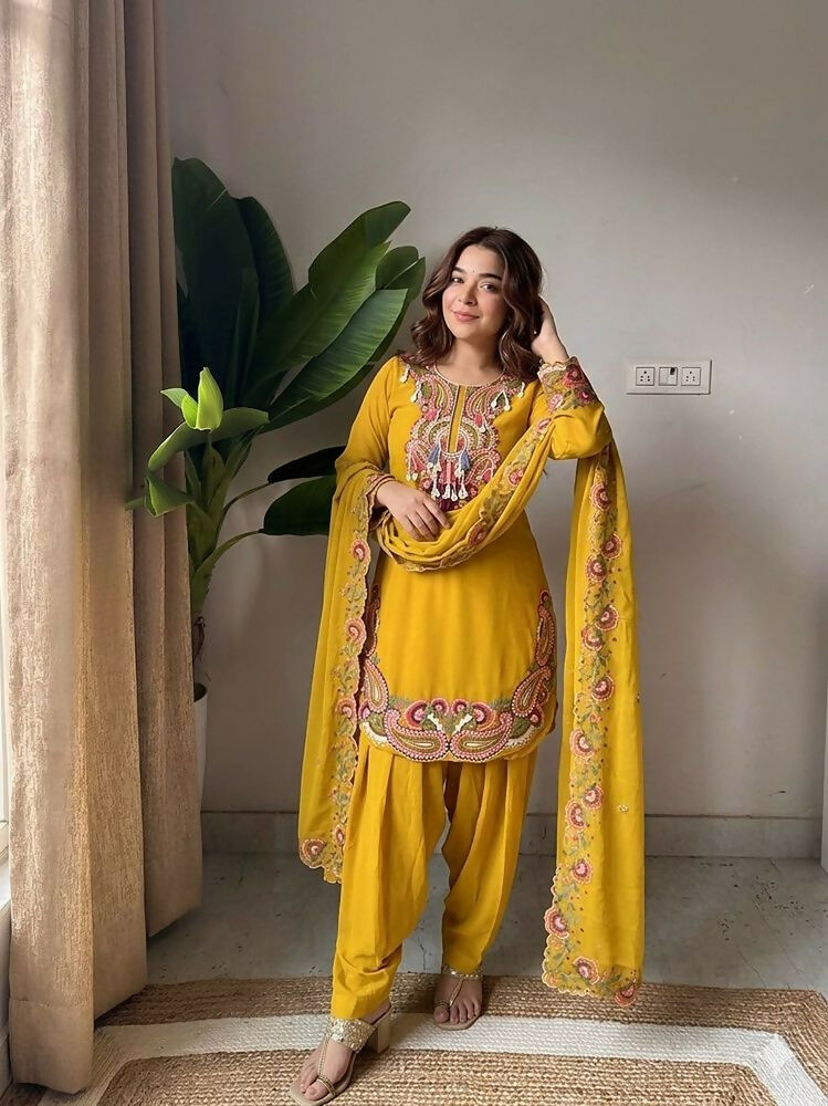 Teeya Creation New Women's Elegant Yellow Straight Cut Suit with Heavy Neckline Embroidery