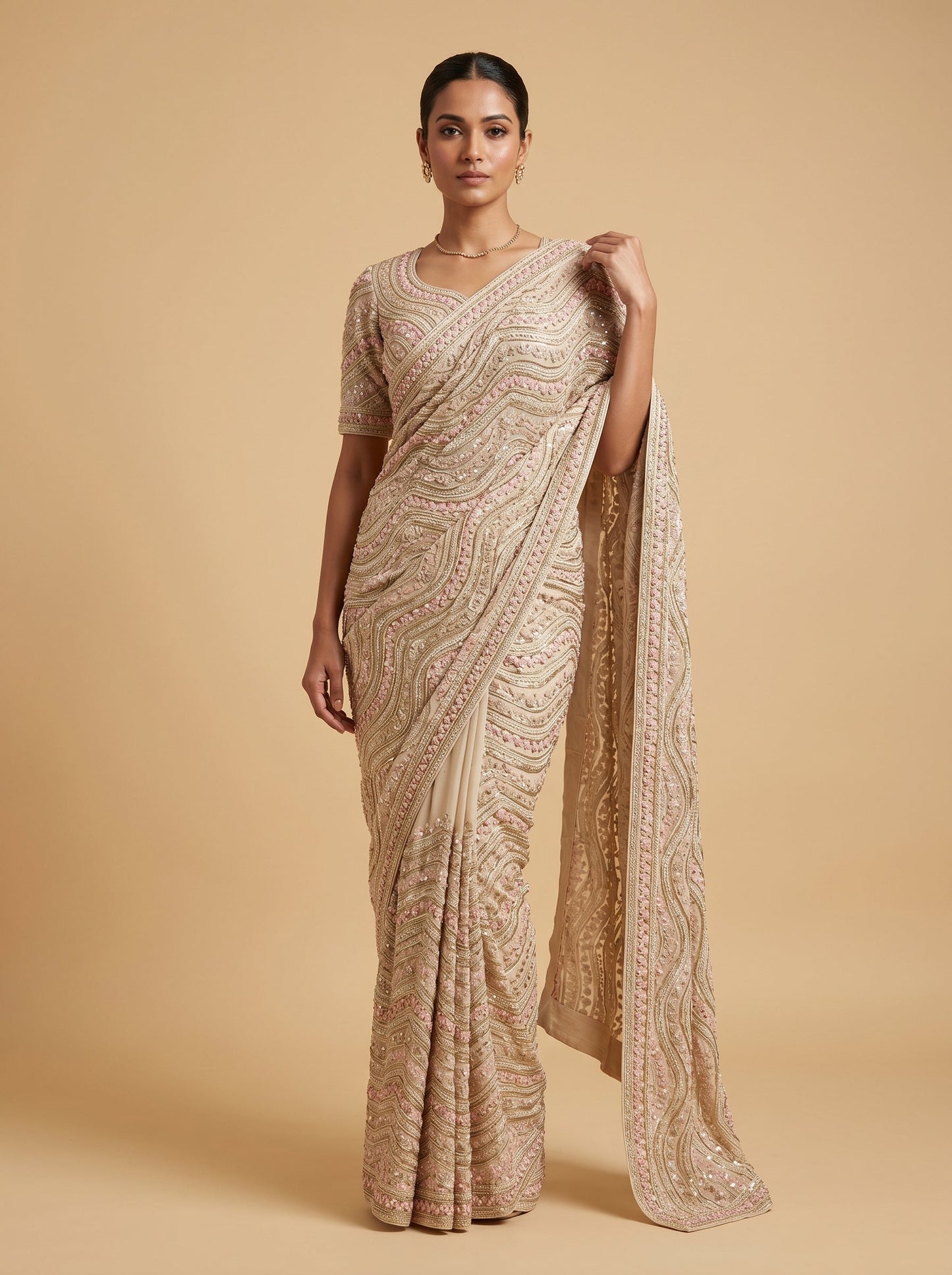 Wine embroidered saree with subtle motifs