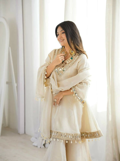 Teeya Creation New Latest Trendy Real Mirror Work With Lace Border Cream Kurta Set
