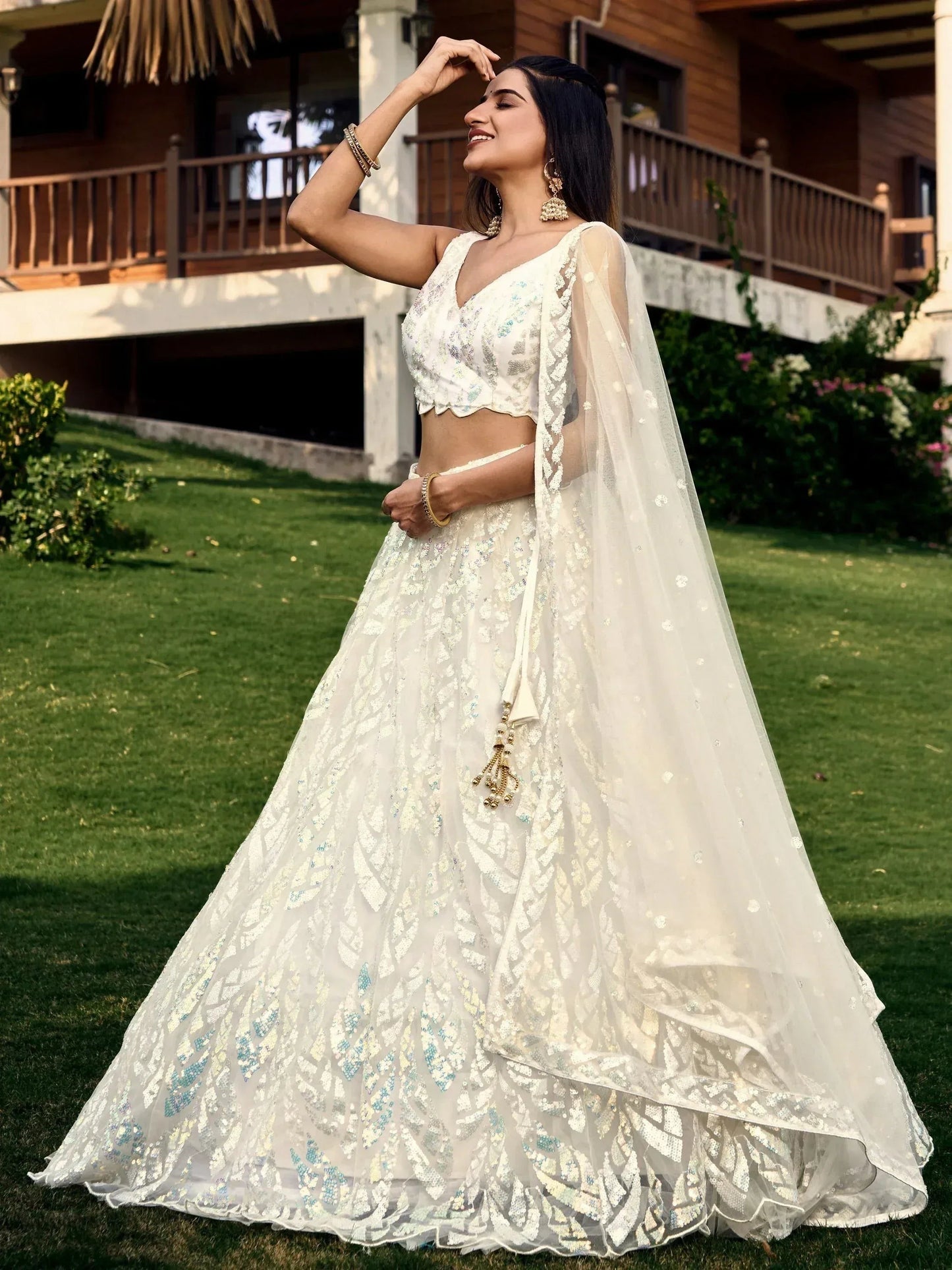 Tulsi Art Astonishing Off-White Sequins Net Lehenga Choli With Dupatta