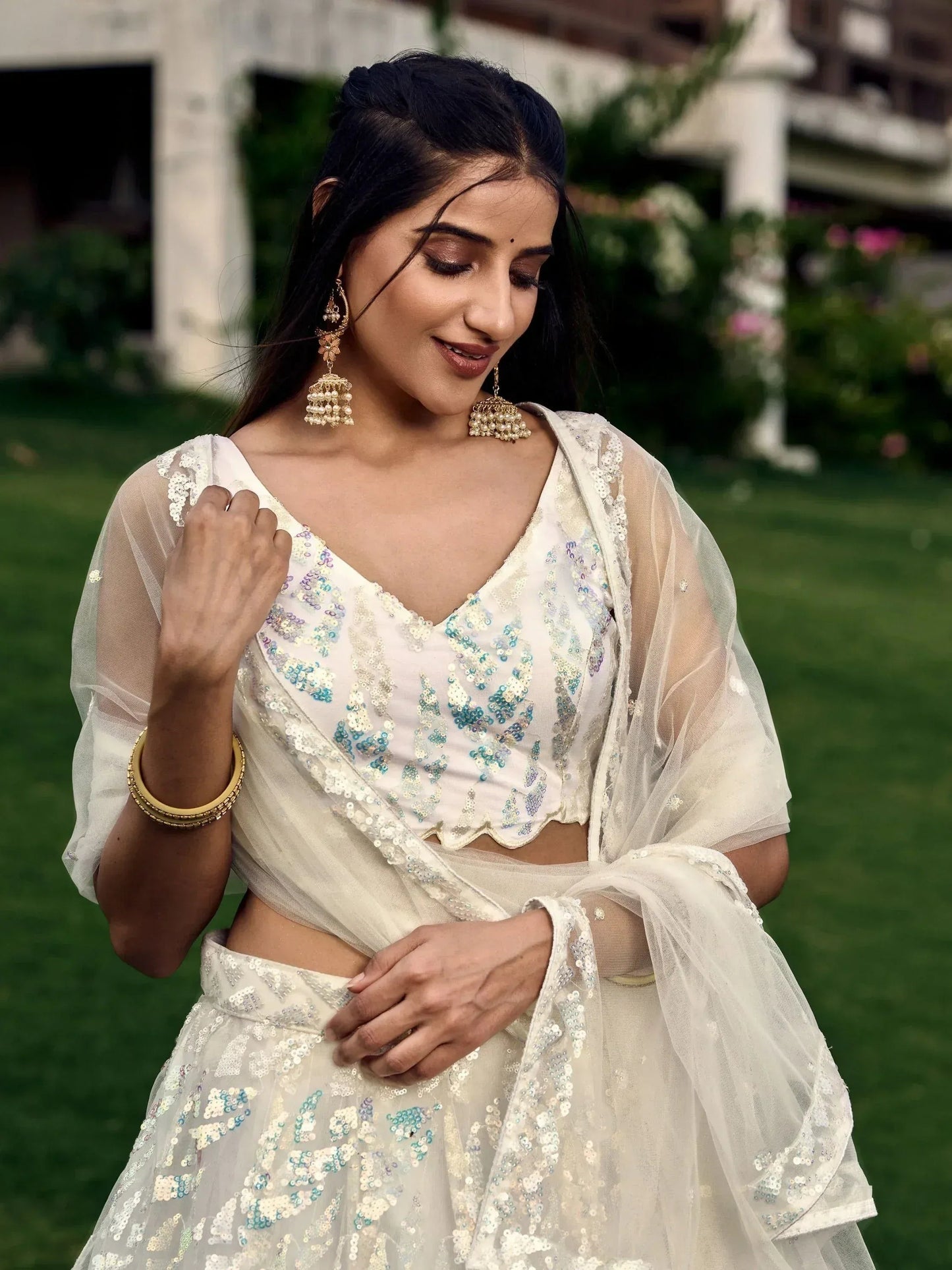 Tulsi Art Astonishing Off-White Sequins Net Lehenga Choli With Dupatta
